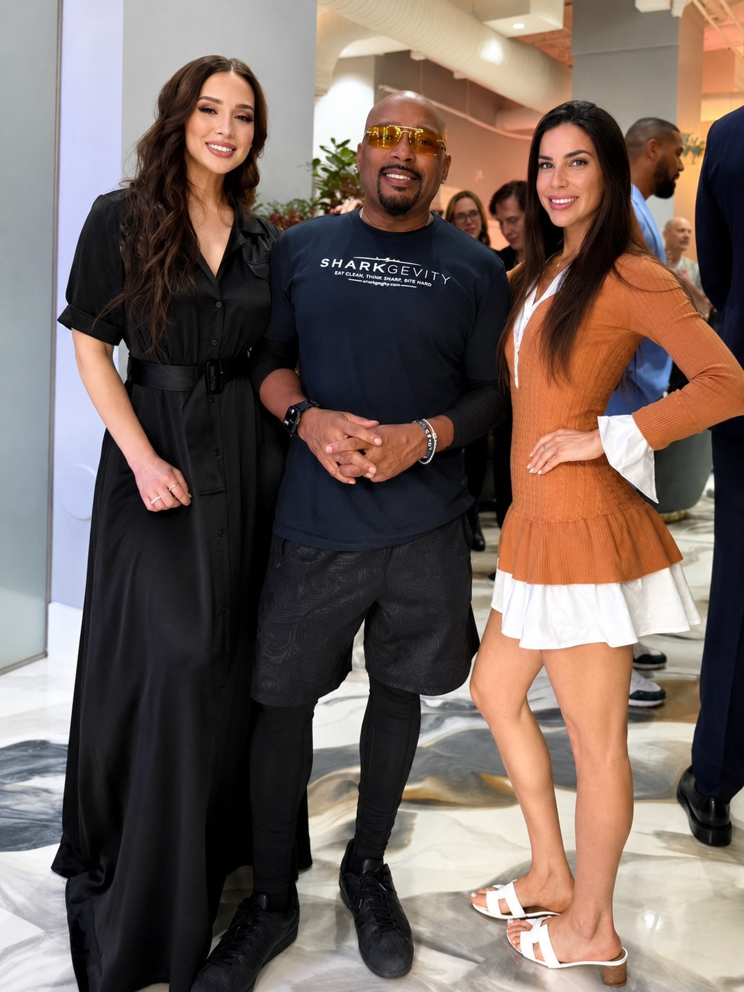 Daymond John with guests at a previous Night With A Shark event at Protocol⁴